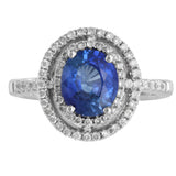 18K White Gold Blue Sapphire Center And Diamond Halo Cocktail Ring