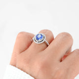 18K White Gold Blue Sapphire Center And Diamond Halo Cocktail Ring