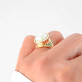 14K Yellow Gold Twisting Button Peal Ring