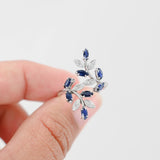 14K White Gold Diamond And Sapphire Cocktail Leaf Design Ring