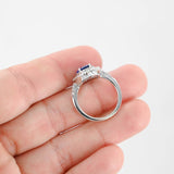 18K White Gold Blue Sapphire Center And Diamond Halo Cocktail Ring