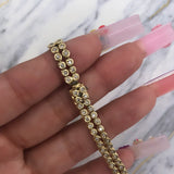 Brazalete de tenis de diamantes de doble hilera de oro amarillo de 14 k