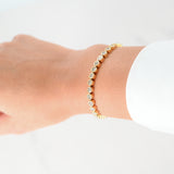 Brazalete de tenis con engaste de bisel de diamantes en oro amarillo de 14 quilates