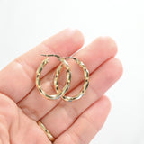 14K Yellow Gold Twisted Oval Hoop Earrings