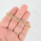 Brazalete de tenis con eslabones en S y diamantes en oro amarillo de 14 quilates