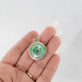 Colgante de donut de jade verde claro de oro amarillo real de 14 quilates