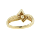 Anillo de oro amarillo de 14 quilates con diamantes redondos y de talla marquesa
